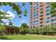 Luxury condo building with a beautifully landscaped courtyard at 1820 Peachtree Nw St # 1909, Atlanta, GA 30309