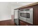 Built in microwave and wine cooler in modern kitchen at 1820 Peachtree Nw St # 1909, Atlanta, GA 30309