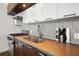 Modern kitchen features stainless steel sink and appliances at 1820 Peachtree Nw St # 1909, Atlanta, GA 30309