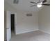 Spacious bedroom with ceiling fan and carpeted floor at 215 Brookwood Cv, Atlanta, GA 30349