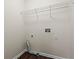 Laundry closet with hookups and shelving at 215 Brookwood Cv, Atlanta, GA 30349