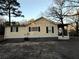 Rear view of the house with access to the backyard at 2675 Flat Shoals Rd, Decatur, GA 30034