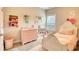 Charming bedroom with a pink dresser and white bed at 340 New Alcovy Rd, Social Circle, GA 30025