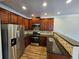 Modern kitchen with stainless steel appliances and granite countertops at 4220 Sw Notting Hill Sw Dr, Atlanta, GA 30331