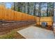 Private backyard with patio and retaining wall at 1028 Rose Dr, Marietta, GA 30060