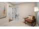 Cozy sitting area with a leather chair and side table in a hallway at 1028 Rose Dr, Marietta, GA 30060