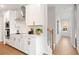 White kitchen with stainless steel appliances and subway tile at 1028 Rose Dr, Marietta, GA 30060