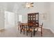 Bright dining room featuring a classic wooden table and hutch at 2614 Grapevine Cir, Cumming, GA 30041