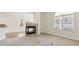 Living room with a tile-faced fireplace at 2614 Grapevine Cir, Cumming, GA 30041