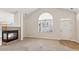 Spacious living room with a fireplace and large window at 2614 Grapevine Cir, Cumming, GA 30041