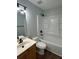 Updated bathroom with tub, shower, and vanity at 268 Springbottom Dr, Lawrenceville, GA 30046