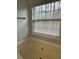 Bright bathroom featuring a large tub, window, and neutral color palette at 268 Springbottom Dr, Lawrenceville, GA 30046