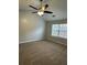 Spacious bedroom with ceiling fan and carpet at 268 Springbottom Dr, Lawrenceville, GA 30046