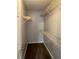 Spacious walk-in closet with multiple shelves, providing ample storage space at 268 Springbottom Dr, Lawrenceville, GA 30046