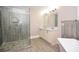 Bathroom with double sinks and a glass door shower at 3002 Laguna Dr, Decatur, GA 30032