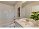 Clean bathroom with white subway tile and bathtub at 606 Broadview Ne Ter, Atlanta, GA 30324