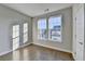 Spacious bedroom with hardwood floors and large windows at 606 Broadview Ne Ter, Atlanta, GA 30324