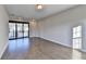 Spacious bedroom with hardwood floors and private balcony at 606 Broadview Ne Ter, Atlanta, GA 30324