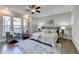 Spacious bedroom with hardwood floors and ceiling fan at 606 Broadview Ne Ter, Atlanta, GA 30324