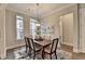 Bright dining room with wood table and seating for six at 606 Broadview Ne Ter, Atlanta, GA 30324