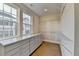 Bright walk-in closet with ample shelving and drawers at 606 Broadview Ne Ter, Atlanta, GA 30324