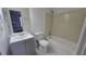 Clean bathroom with vanity, toilet, and bathtub at 6628 Wellington Sq, Norcross, GA 30093