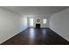 Living room with fireplace and dark brown wood-look flooring at 6628 Wellington Sq, Norcross, GA 30093