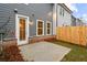 Private backyard patio with wood fence and gray siding at 1032 Rose Dr, Marietta, GA 30060