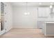 Light and airy dining room with hardwood floors and access to patio at 1032 Rose Dr, Marietta, GA 30060