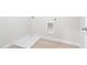 Laundry area with vinyl flooring and built in cabinets at 1032 Rose Dr, Marietta, GA 30060
