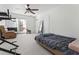 Versatile bedroom with a daybed, recliner, and access to a private patio at 1150 Collier Nw Rd # J15, Atlanta, GA 30318