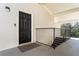 Private building entrance with keyless entry and stairs at 1150 Collier Nw Rd # J15, Atlanta, GA 30318