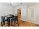 Dining area with four-person table and kitchen access at 1150 Collier Nw Rd # J15, Atlanta, GA 30318