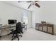 Bright home office features a desk, chair, and built-in shelving at 1150 Collier Nw Rd # J15, Atlanta, GA 30318