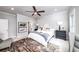 Bright bedroom featuring a king-size bed and en-suite bathroom access at 1417 Coretta Scott Bnd, Atlanta, GA 30318