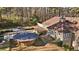 House with large backyard, gazebo, and surrounding woods at 157 Timberlost Trl, Suwanee, GA 30024
