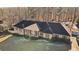 Ranch style home with large lot and mature trees at 157 Timberlost Trl, Suwanee, GA 30024