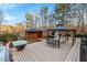 Spacious deck with gazebo, unique structure, and seating area at 157 Timberlost Trl, Suwanee, GA 30024