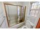 Clean bathroom with shower/tub combo and updated toilet at 157 Timberlost Trl, Suwanee, GA 30024