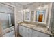Bathroom with granite countertops and double sinks at 157 Timberlost Trl, Suwanee, GA 30024