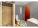 Basement bathroom with shower and updated toilet at 157 Timberlost Trl, Suwanee, GA 30024