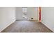 Bright bedroom with neutral carpeting and large window at 157 Timberlost Trl, Suwanee, GA 30024