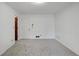 Spacious bedroom with neutral carpeting and ample natural light at 157 Timberlost Trl, Suwanee, GA 30024