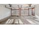 Two-car garage with automatic openers and extra storage at 157 Timberlost Trl, Suwanee, GA 30024