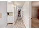 Long hallway with tile floors and access to other rooms at 157 Timberlost Trl, Suwanee, GA 30024