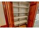 Walk-in pantry with ample shelving at 157 Timberlost Trl, Suwanee, GA 30024