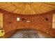 Round room with wood ceiling and unique cob wall at 157 Timberlost Trl, Suwanee, GA 30024