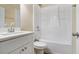 Clean bathroom with white vanity, bathtub, and shower at 2329 Abner Nw Pl, Atlanta, GA 30318