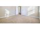 Bright bedroom with neutral carpeting and ample closet space at 2329 Abner Nw Pl, Atlanta, GA 30318