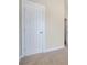 White bedroom door with classic five-panel design at 2329 Abner Nw Pl, Atlanta, GA 30318
